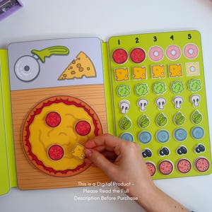 May include: A colorful pizza-themed educational toy. The open book shows a pizza with toppings, a pizza cutter, and a slice of cheese. The right page has various pizza toppings. The text at the bottom says, "This is a Digital Product - Please Read the Full Description Before Purchase."