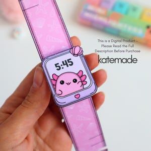 May include: A pink smartwatch with a cartoon axolotl on the screen, displaying the time 5:45. The watch band is also pink and decorated with seashells and starfish. The text "katemade" is visible. The text "This is a Digital Product - Please Read the Full Description Before Purchase" is also visible.