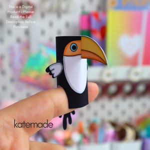 May include: A paper toucan finger puppet featuring a black body, white chest, and a large orange beak. The text "This is a Digital Product - Please Read the Full Description Before Purchase" is visible at the top, and "katemade" is at the bottom.