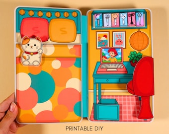 May include: A printable DIY project featuring a colorful dollhouse design. The interior includes a bedroom with a cat figurine and a living room with a laptop and red chair. The text "PRINTABLE DIY PROJECT" and "Instant Download | PDF" are visible.