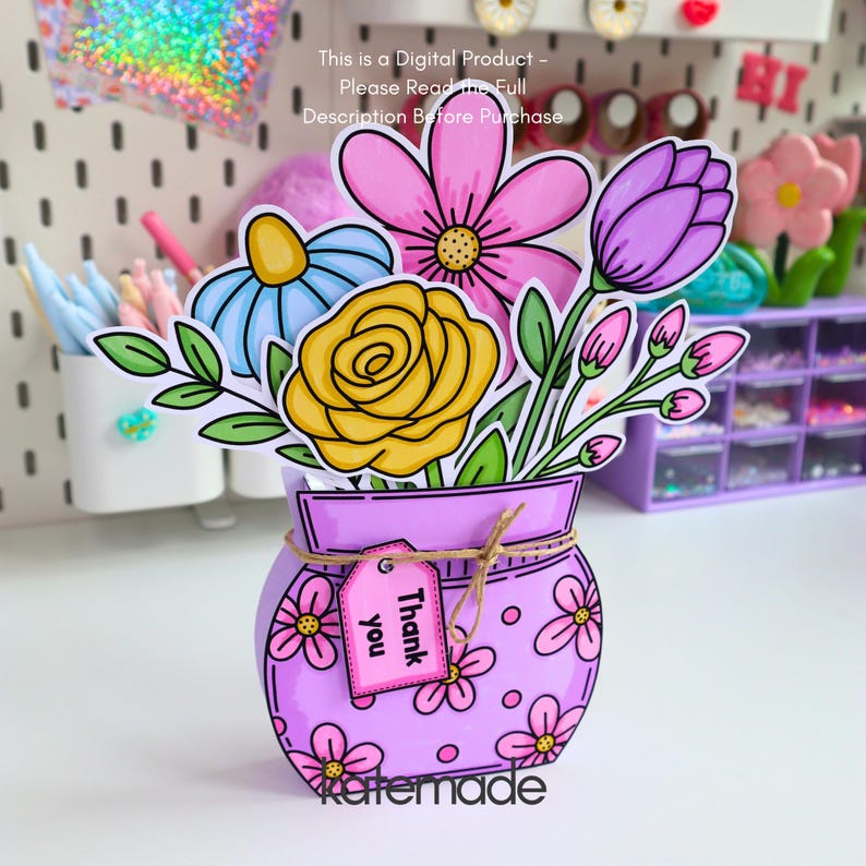 May include: A digital product illustration of a light purple vase decorated with pink flowers and a small tag that reads Thank you. The vase holds a colorful bouquet of a yellow rose, a pink daisy, a blue flower, and purple flower buds.