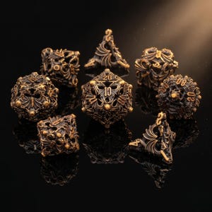 May include: A collection of bronze-coloured metal dice, ideal for tabletop games. The dice feature detailed, decorative designs and are displayed on a dark surface. The set includes different dice shapes, including a twenty-sided die with the number 10 visible.