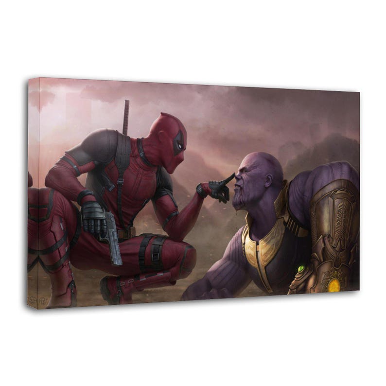 May include: Canvas art print featuring Deadpool and Thanos in a humorous confrontation. Deadpool, in his signature red and black suit, points at Thanos's nose. Thanos, with purple skin and gold armor, looks on. The background is a cloudy, reddish-brown.