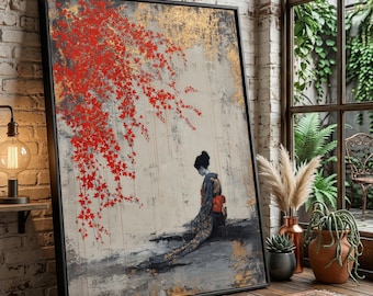 Könnte beinhalten: Gerahmtes Kunstwerk mit einer Geisha in einem Kimono, die unter rotem Laub sitzt. Das Gemälde hat einen neutralen Hintergrund mit goldenen Akzenten. Das Kunstwerk wird in einem Raum mit einer Backsteinmauer und einem Fenster mit Pflanzen ausgestellt.