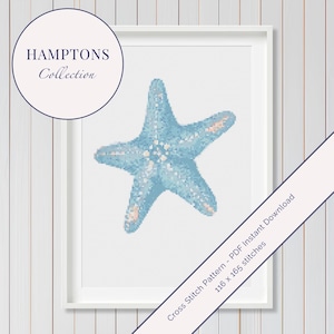 May include: A framed cross-stitch pattern featuring a light blue starfish. The artwork is part of the "Hamptons Collection" and includes the text "Cross Stitch Pattern - PDF Instant Download" with stitch count details.