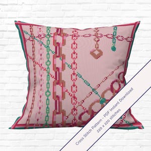 May include: A square decorative pillow with a pink background and a chain pattern in shades of pink, red, and green. The pillow has a dark pink border with a green trim. Text on the image reads "Cross Stitch Pattern - PDF Instant Download 220 x 220 stitches."