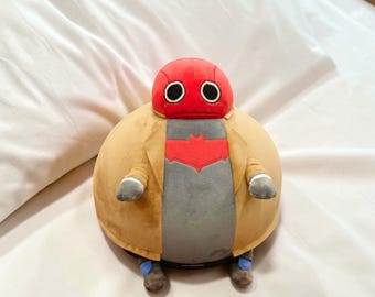 Peluche di Red Hood / Bambola da collezione ispirata a Jason Todd (circa 22 cm)