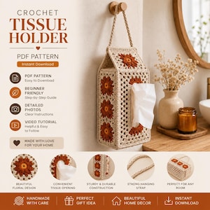 Puede incluir: Un soporte para pañuelos de ganchillo en color beige con forma rectangular, una correa para colgar y un motivo floral en tonos naranja y marrón. El soporte tiene una abertura central para dispensar pañuelos y cuelga de un gancho de pared.