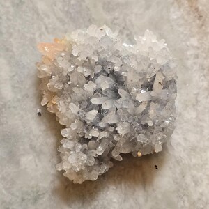 Quartz cluster with natural limonite staining and subtle blue iridescence | Bulgaria