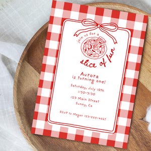 May include: A red and white checkered pizza-themed invitation. The invitation features a pizza graphic and the text "join us for a slice of fun". It includes the text "Aurora is turning one!" and event details.