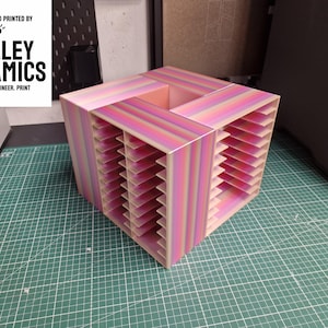 A custom tray holder for diamond art storage we designed and printed. Custom colourways can be requested in a variety of colour changing styles.
