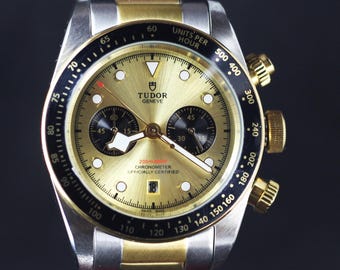 Automatic Tudor Chronograph Men's Watch In Golden Dial With Date Indicator.