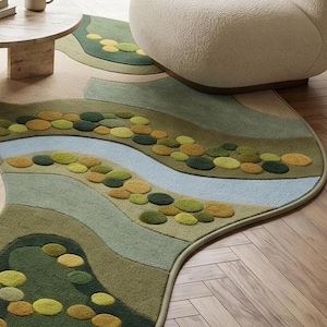 Detail of a premium hand-tufted wool nursery rug highlighting the ultra-plush dense pile and crisp 3D hand-carving of nature elements.