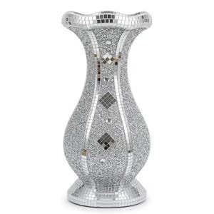 May include: A silver vase with a flared, scalloped rim and a rounded base. The surface is covered in a combination of small, reflective square mirror tiles and a dense, sparkling silver glitter texture, featuring diamond-shaped mirror accents.