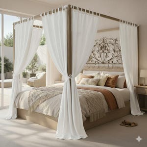 May include: A four-poster bed with a light wood frame and white sheer curtains. The bed is made with a beige comforter, decorative pillows, and a fringed throw blanket. A decorative metal wall hanging is above the headboard.