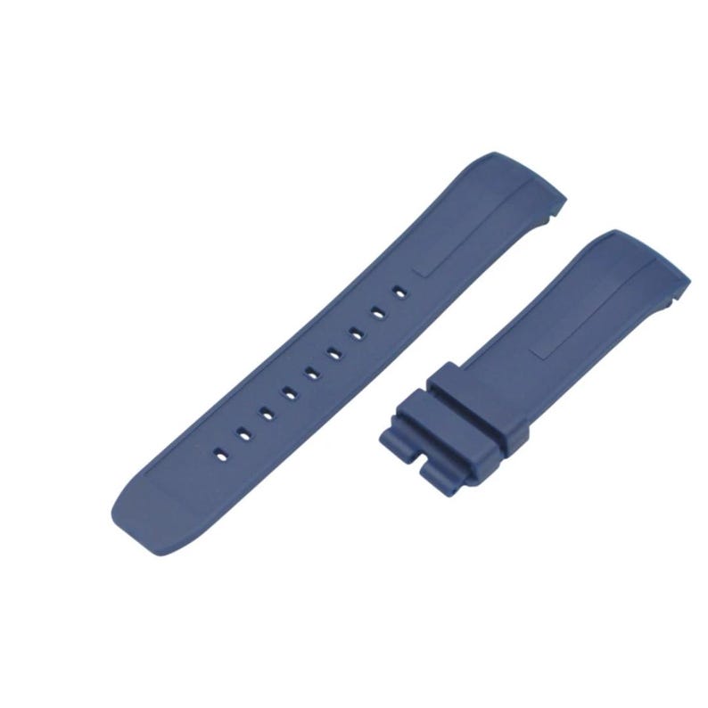 May include: A dark blue silicone watch strap consisting of two separate pieces. One piece features a series of adjustment holes for a buckle, while the other piece includes a fixed loop and a notched end designed for attachment to a watch case.