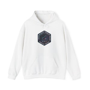 May include: White hooded sweatshirt with a front pocket and drawstring. The front features a colorful, hexagonal graphic with the text "Vacuum-Rated Problem Solver". The graphic includes a rocket ship design and social media icons.