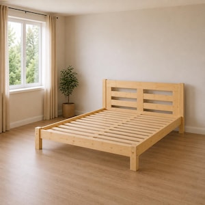 May include: A light-coloured wooden bed frame featuring a slatted headboard with two horizontal openings and a slatted base. The frame is constructed from natural wood with a visible grain, standing on four sturdy legs on a light wood floor.