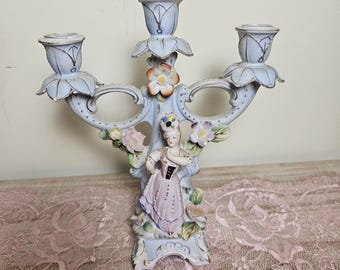 Vintage Porcelain three-arm candelabra with Victorian lady figurine and floral decoration
