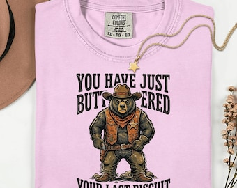 Camiseta "Has untado mantequilla en tu última galleta" — divertido regalo del oeste para los amantes de la música country.