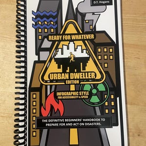 May include: A spiral-bound handbook titled Ready for Whatever Urban Dweller Edition. The cover features a graphic illustration of a city with a yellow warning triangle, a running figure, fire, and a radiation symbol. Text includes Created by D.T. Hogans.