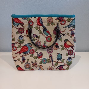 Hermoso bolso/cartera de tela con forma de pájaro