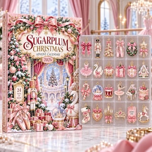 Könnte beinhalten: Ein Sugarplum Christmas 2026 Adventskalender mit Nussknacker-, Schwan- und Ballettmotiven, dazu ein durchsichtiges Kunststofftablett mit vierundzwanzig einzelnen goldfarbenen Metallanhängern in Form von Feiertags- und Ballettsymbolen.