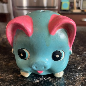 Adorável cofrinho vintage em forma de porco da Hull Pottery, modelo Corky Pig!