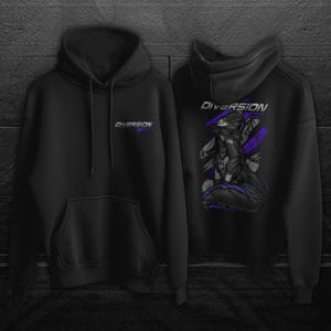 May include: Black hoodie with the word "DIVERSION" printed in white and purple on the front and back. The back of the hoodie features a graphic of a character in shades of black, purple, and gray.