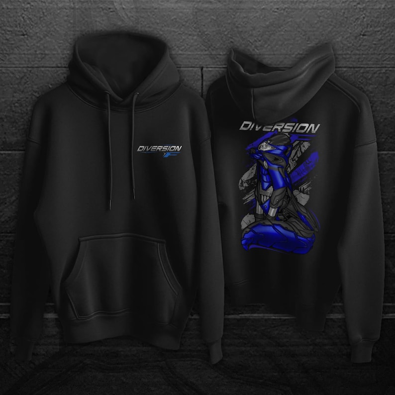 May include: Black hoodie with the word "DIVERSION" printed in white and blue on the front and back. The back of the hoodie features a blue and gray graphic design. The hoodie has a hood and a front pocket.