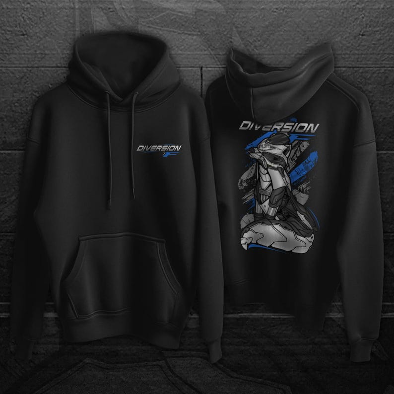 May include: Black hoodie with the word "DIVERSION" in blue and white on the front and back. The back features a graphic of a futuristic raccoon in shades of gray and blue. The hoodie has a hood and a front pocket.