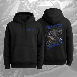 May include: Black hoodie with a front pocket and a drawstring hood. The front features the blue letters "RJM". The back displays a motorcycle graphic with blue accents and the letters "RJM".