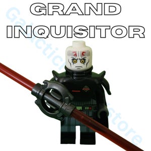 May include: A black Lego figure of the Grand Inquisitor, holding a red lightsaber. The figure has a white head with red and black markings and yellow eyes. The text "GRAND INQUISITOR" is above the figure.