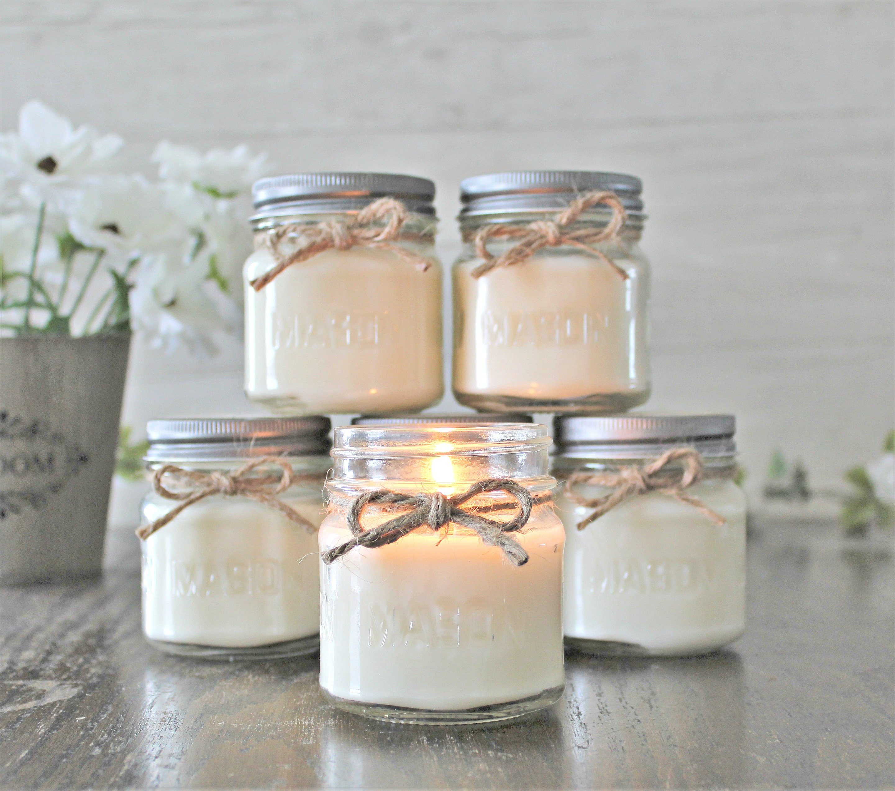 16 oz Mason jar candles filled to 14 oz to give you room that extra