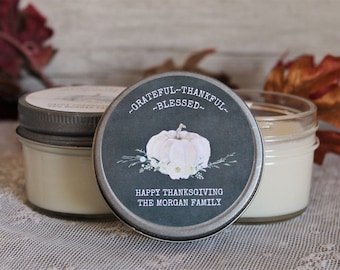 May include: A white pumpkin with green leaves and a gray background with the text "Grateful-Thankful-Blessed" and "Happy Thanksgiving The Morgan Family".