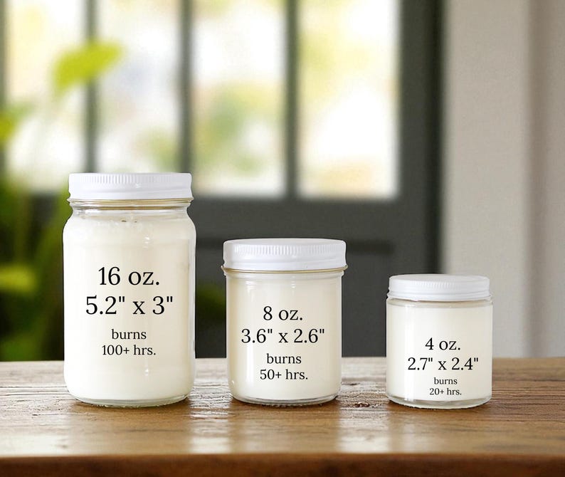 May include: Three clear glass jar candles with white lids, arranged by size. The largest is 16 oz. (5.2" x 3") with 100+ hrs. burn time, the middle is 8 oz. (3.6" x 2.6") with 50+ hrs., and the smallest is 4 oz. (2.7" x 2.4") with 20+ hrs.