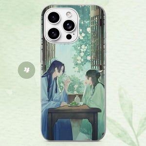 May include: A smartphone case featuring an illustration of two individuals in traditional attire sitting at a wooden table. They are drinking tea in a garden setting with white flowers and wooden window frames visible in the background.