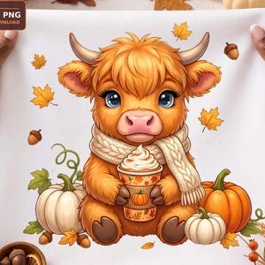May include: A digital illustration of a fluffy ginger Highland calf wearing a cream-colored knit scarf, holding a coffee cup topped with whipped cream, surrounded by orange and white pumpkins, acorns, and scattered yellow autumn maple leaves.