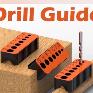 May include: A set of three orange and black drill guide blocks with the text Drill Guide at the top. Each block features a series of holes numbered 4 through 10, designed to align with a drill bit for precise drilling on flat or rounded surfaces.