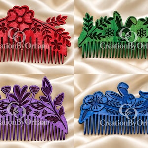 May include: Four decorative hair combs in red, green, purple, and blue, each featuring intricate laser-cut floral or rabbit motifs and the text CreationByOrhaan. These wooden accessories display detailed botanical patterns and animal silhouettes.
