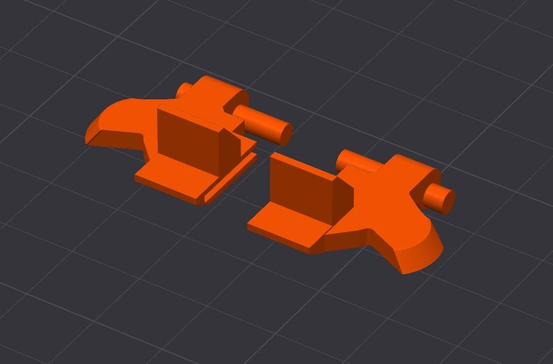May include: Two orange, geometric shapes, possibly components of a larger structure, are displayed against a dark gray grid background. Each shape has a rectangular base and a cylindrical protrusion.