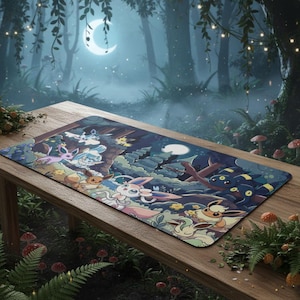 May include: A rectangular playmat featuring a forest scene with a crescent moon and various cartoon creatures. The mat has a dark blue and green color scheme with cartoon characters in the foreground. The mat is on a wooden table.