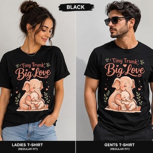 May include: Black t-shirts with a graphic of two elephants hugging, with the text "Tiny Trunk, Big Love" in pink and green. The shirts are labeled "Ladies T-Shirt" and "Gents T-Shirt."