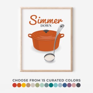 May include: A framed print featuring a vibrant orange Dutch oven and a silver ladle with a heart-shaped detail. The words "Simmer Down" are written in a stylish font. The bottom of the print displays a color palette with the text "CHOOSE FROM 15 CURATED COLORS."