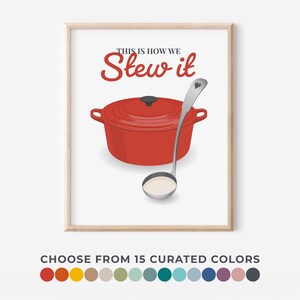 May include: A framed print featuring a red Dutch oven and a ladle with a heart-shaped detail. The text "THIS IS HOW WE Stew it" is in red script. Below, the text "CHOOSE FROM 15 CURATED COLORS" is displayed.