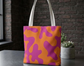 Bolso de mano con estampado abstracto de camuflaje rosa y naranja