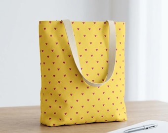 Bolso tote con estampado de pequeños corazones rojos / Diseño estampado de corazones amarillos por toda la prenda