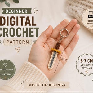 Può includere: Un portachiavi a forma di mini spada all'uncinetto con impugnatura marrone, guardia giallo senape e lama beige chiaro con una linea centrale grigio scuro. Il portachiavi misura 6-7 cm di lunghezza come indicato nell'immagine del modello.