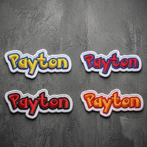 May include: Four embroidered patches featuring the name Payton in a stylized font. The top left patch is yellow with a blue border, the top right is red with a blue border, the bottom left is red with a black border, and the bottom right is orange with a red border.