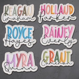 May include: Six embroidered patches featuring names in various colors and fonts. The names include Reagan Graham, Holland Parker, Royce Hayes, Rainey Everly, Myra Quinn, and Grant Cameron. Each patch has a white border and a textured, stitched appearance.